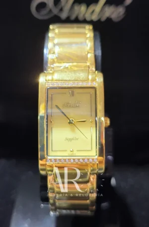 Reloj André dorado vertical solid